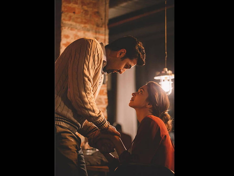 Tamasha Movie Still: Intimate Moment Between Two Characters in Warm Dim Lighting HD wallpaper