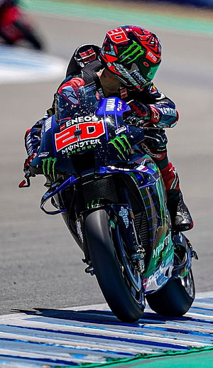 Fabio Quartararo Riding Yamaha YZR-M1 in MotoGP Race Action HD phone wallpaper