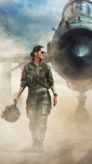 Indian Air Force female fighter jet pilot walking on tarmac with helmet HD phone wallpaper