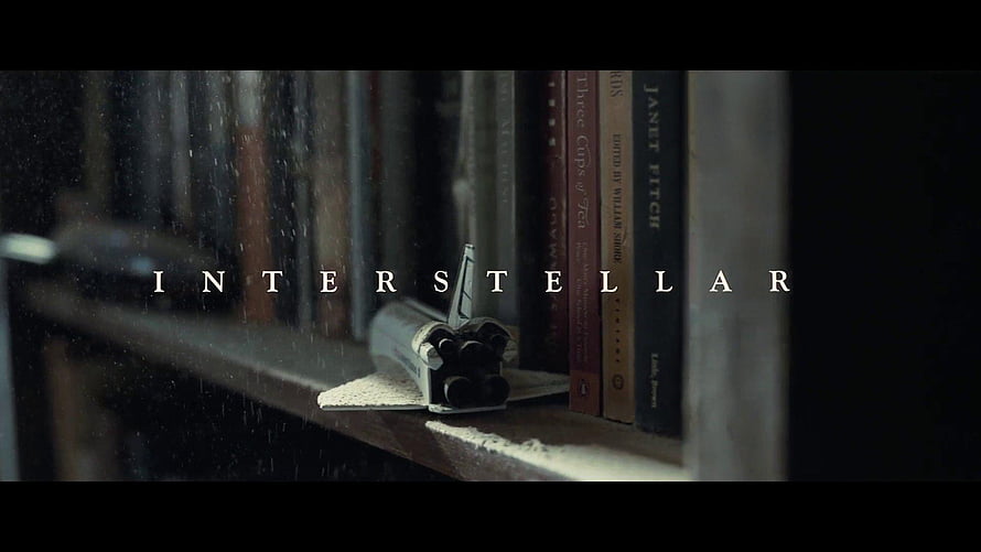 Interstellar Movie Scene Featuring Model Spaceship on Dusty Bookshelf HD wallpaper