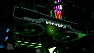 Nvidia GeForce RTX 2080 Ti Graphics Card with Green RGB Lighting Inside a PC Case HD wallpaper