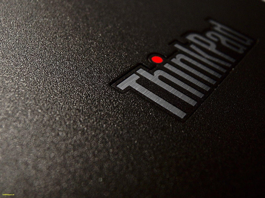 Lenovo ThinkPad Logo Close-Up on Textured Black Laptop Surface HD wallpaper