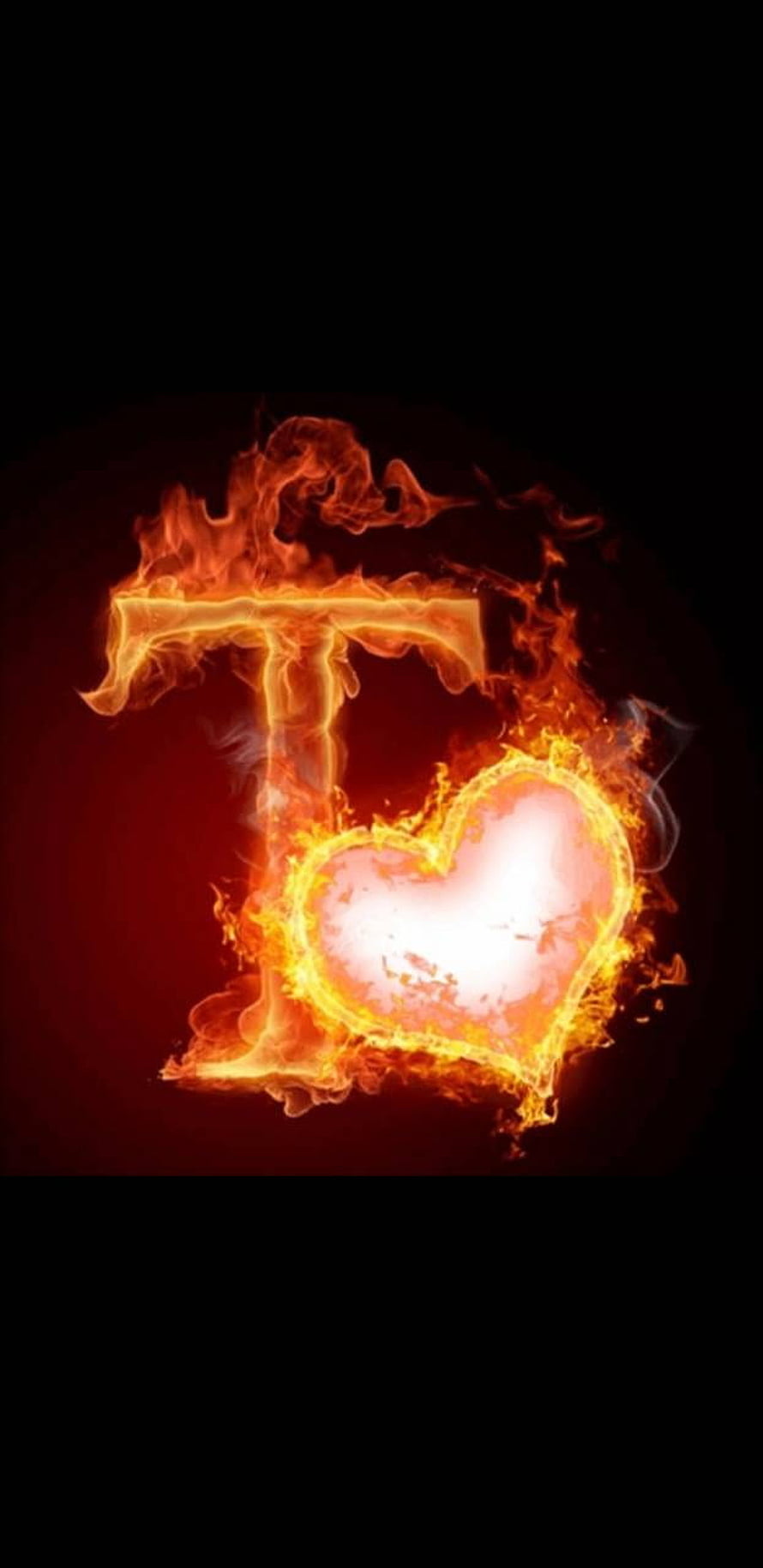 Flaming Letter T with Glowing Heart Design on Dark Background HD phone wallpaper