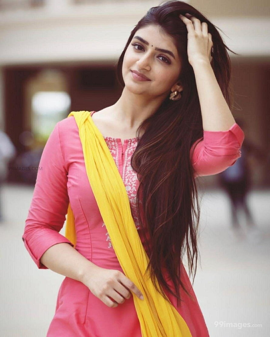 Pooja Hegde in a Pink Kurti and Yellow Dupatta Portrait HD phone wallpaper