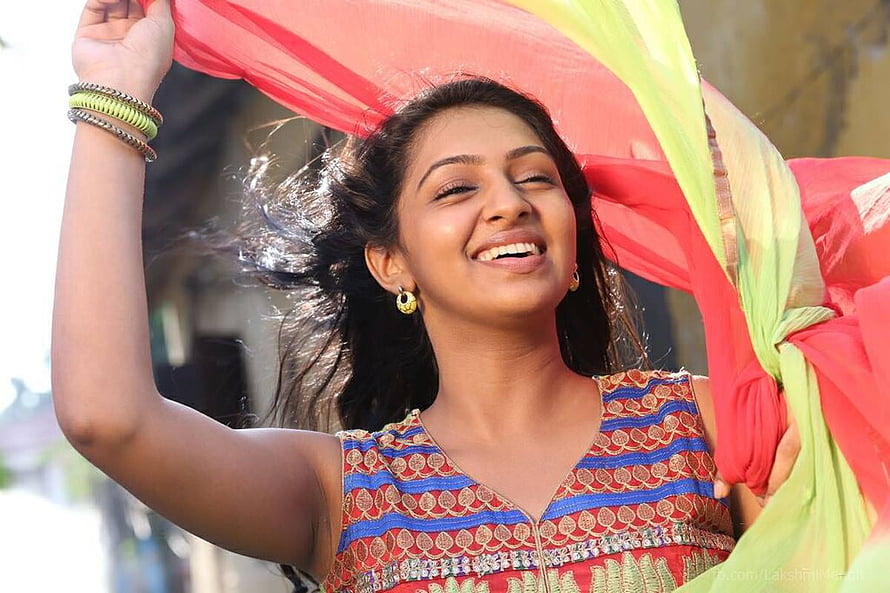 Smiling Indian woman in traditional ethnic wear holding vibrant red and green fabric outdoors, Love Quotes Tamil Actress Hot Underarm, hairy armpit anime girl HD wallpaper