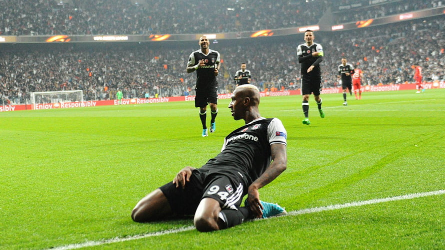 Talisca Sliding on the Pitch During a Football Match in a Black Kit HD wallpaper