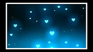 Glowing Cyan Hearts Floating in a Dark Blue Night Sky HD wallpaper