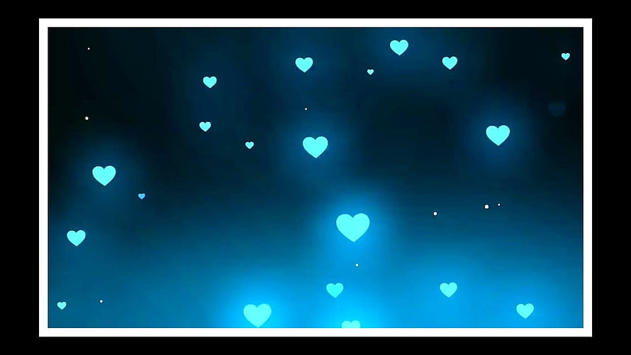 Glowing Cyan Hearts Floating in a Dark Blue Night Sky HD wallpaper