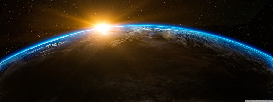 Sunrise Over Earth Horizon From Space With Blue Atmosphere Glow And Starry Background HD wallpaper