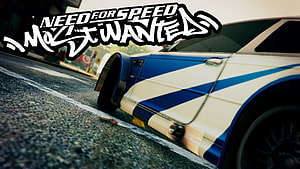 Need For Speed Most Wanted Blue and White Striped Muscle Car on Wet Asphalt HD wallpaper