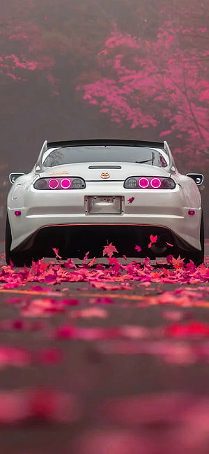 White Toyota Supra RZ Rear View With Pink Taillights Amidst Autumn Leaves HD phone wallpaper