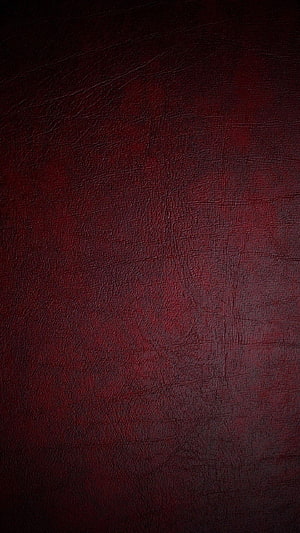 Dark Red Leather Texture Background with Subtle Grain and Vignette HD phone wallpaper