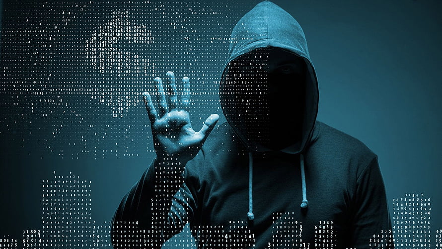 Hooded Hacker Silhouette with Digital Data Overlay and Cybersecurity Theme HD wallpaper