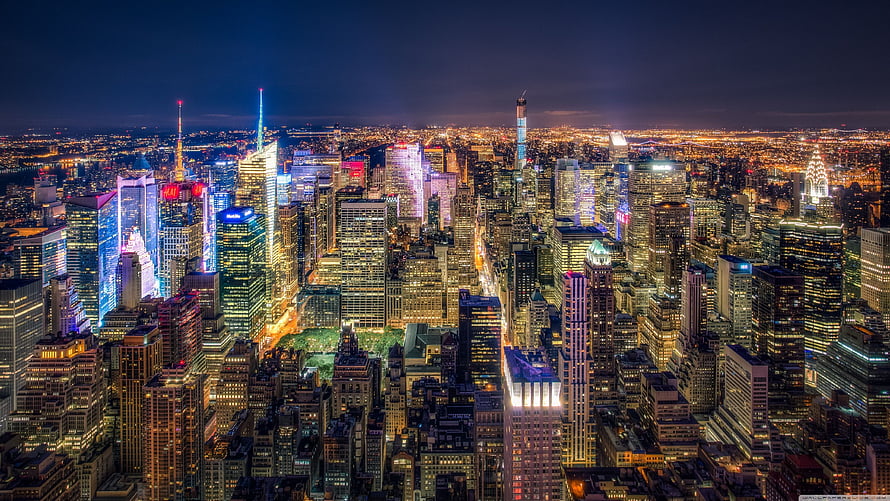 New York City Manhattan Skyline Illuminated at Night with Central Park and Skyscrapers HD wallpaper