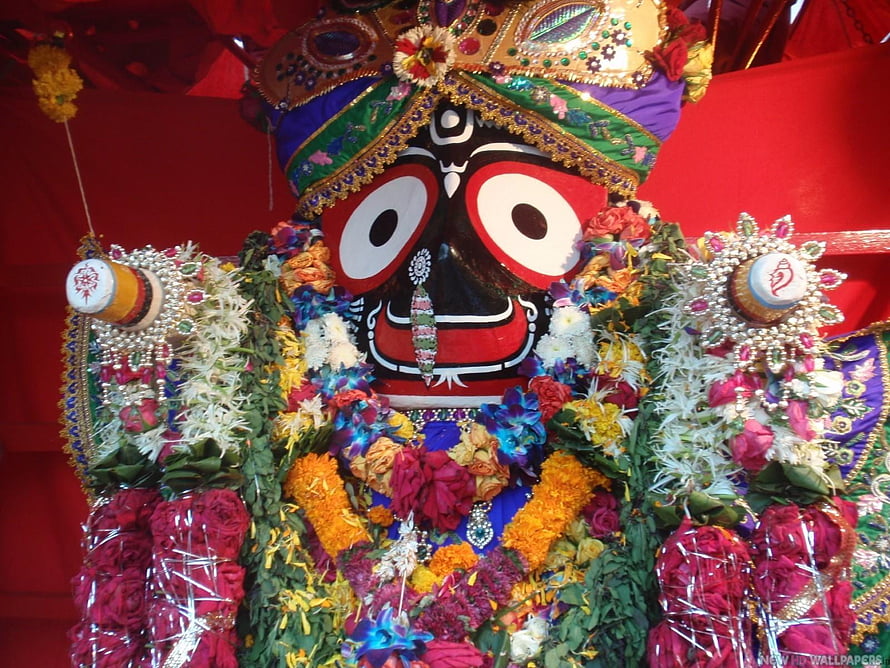 Colorful Kali Maa idol adorned with flowers and jewelry for Durga Puja festival celebration HD wallpaper