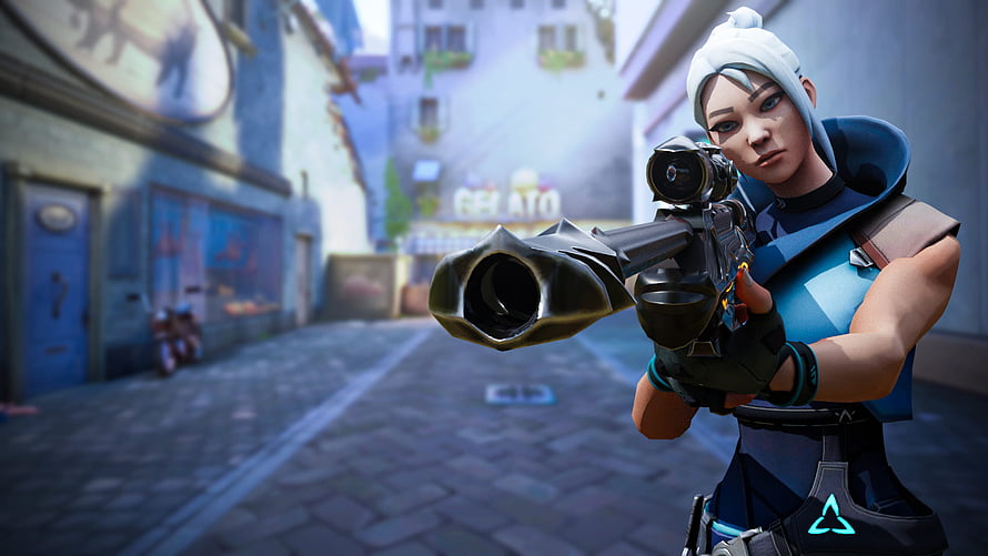 Ashe from Valorant aiming sniper rifle in blue tactical outfit on city street HD wallpaper