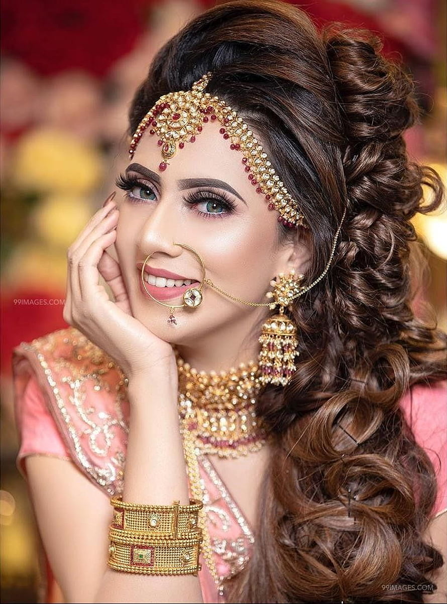 Elegant Indian Bride in Pink Lehenga with Traditional Gold Jewelry and Nose Ring HD phone wallpaper