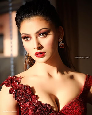 Urvashi Rautela in a Red Sequined Gown with Dramatic Makeup and Elegant Earrings HD phone wallpaper