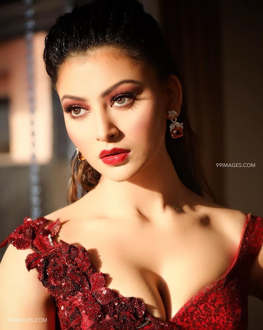 Urvashi Rautela in a Red Sequined Gown with Dramatic Makeup and Elegant Earrings HD phone wallpaper