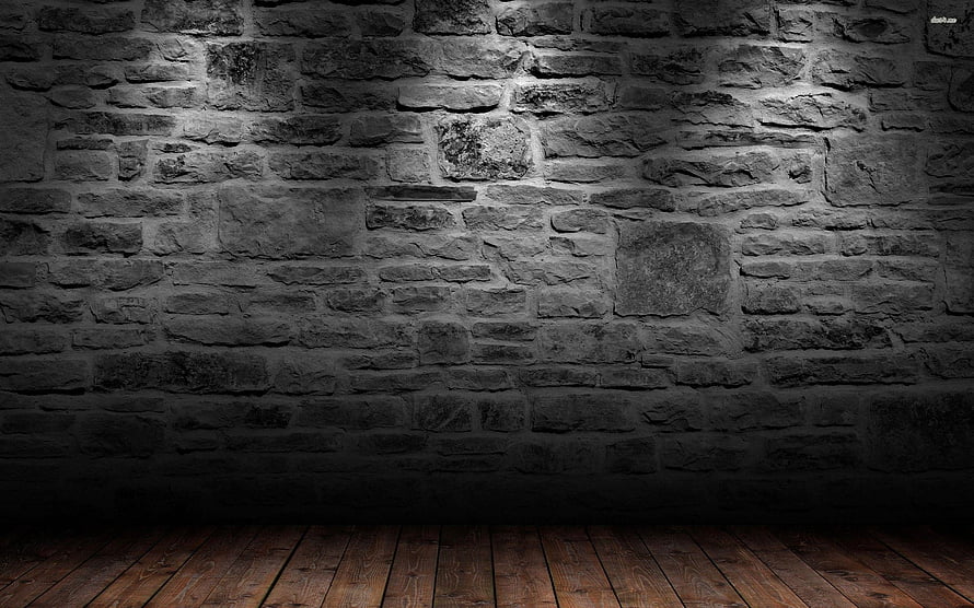 Dark rustic stone brick wall with weathered wooden plank floor in moody interior setting HD wallpaper