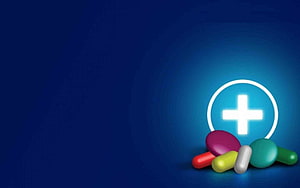 Colorful Pharmaceutical Pills and Capsules with Glowing Medical Cross Symbol on Deep Blue Background HD wallpaper