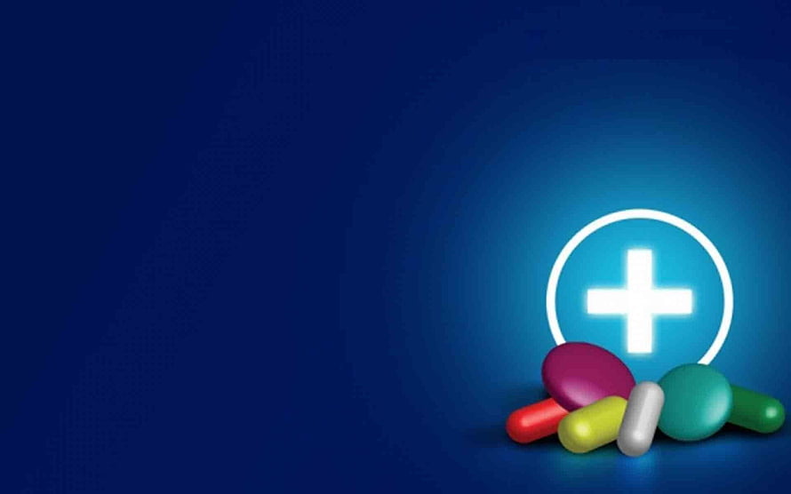 Colorful Pharmaceutical Pills and Capsules with Glowing Medical Cross Symbol on Deep Blue Background HD wallpaper