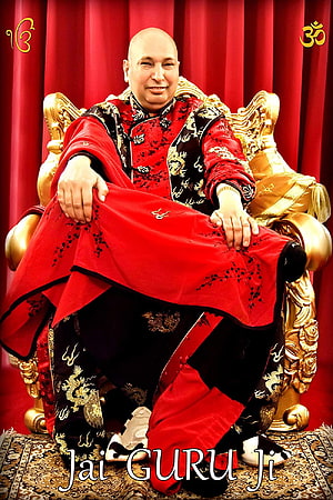 Gurmeet Ram Rahim Singh Portrait in Red and Black Traditional Attire on Golden Throne HD phone wallpaper