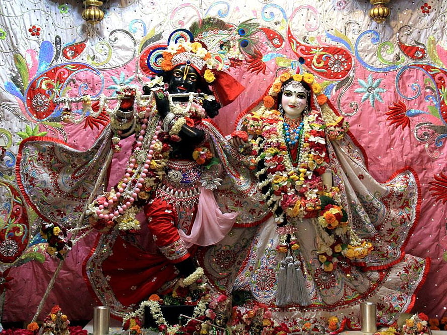 Ornate Krishna and Radha Deities in Traditional Festive Attire HD wallpaper
