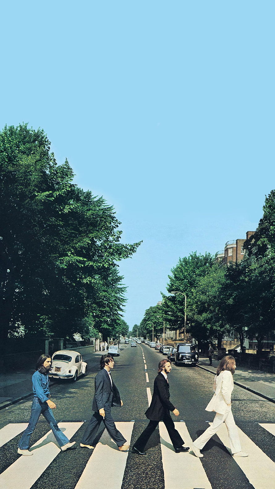 The Beatles crossing Abbey Road zebra crossing in iconic album cover photo HD phone wallpaper