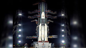 ISRO PSLV Rocket on Launch Pad at Night with Floodlights HD wallpaper