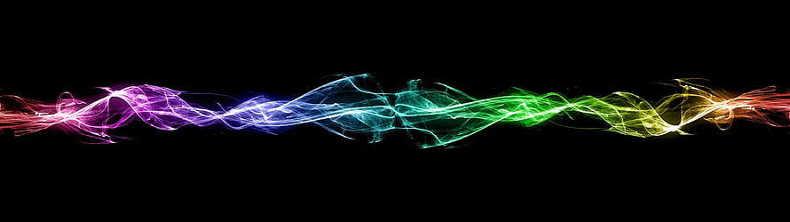 Vibrant Rainbow Light Streaks Flowing Across Black Background HD wallpaper
