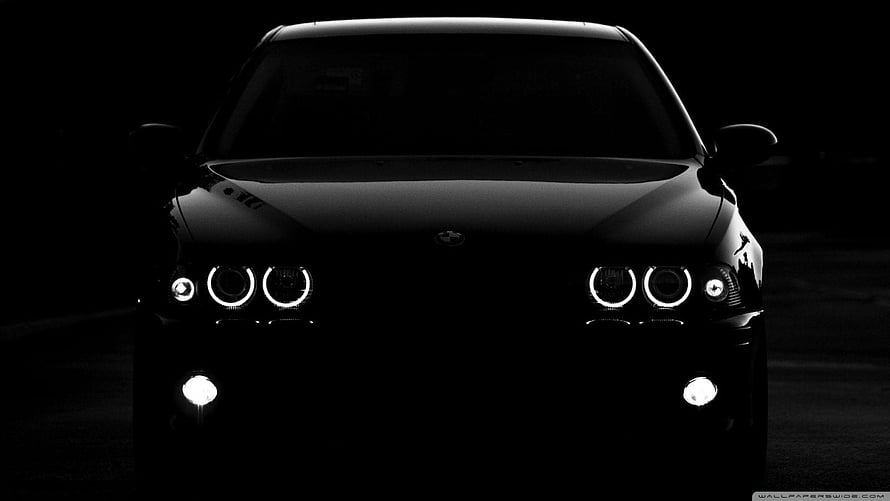 Black BMW M3 Front View With Angel Eyes Headlights In Dark Night Setting HD wallpaper