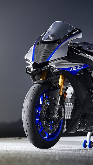 Yamaha YZF-R1M Superbike Front Profile with Carbon Fiber Fairing and Blue Accents HD phone wallpaper
