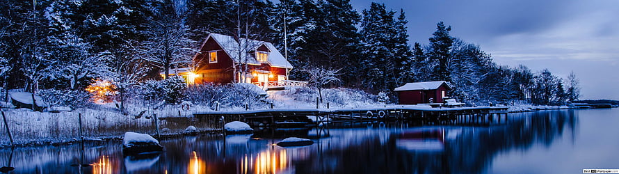 Cozy Red Cabin by Frozen Lake at Twilight with Snowy Forest and Warm Light Reflections HD wallpaper