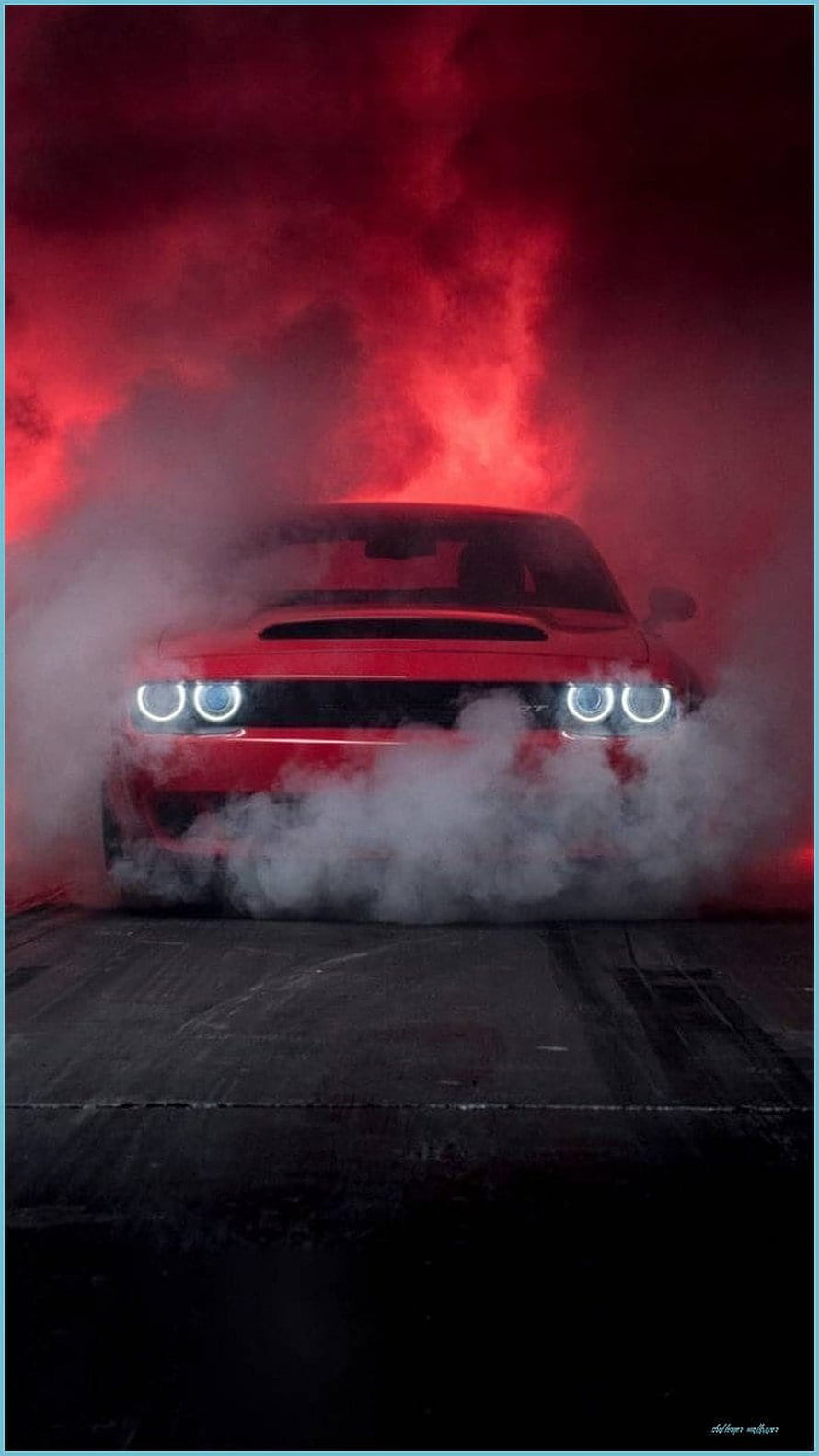 Red Dodge Challenger SRT Hellcat emerging from thick smoke under dramatic red lighting HD phone wallpaper