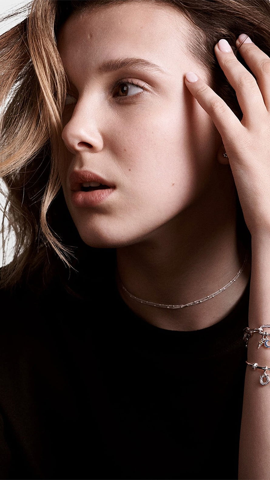 Millie Bobby Brown Close-Up Portrait With Silver Jewelry And Black Top HD phone wallpaper