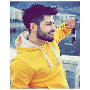 Handsome Man in Yellow Hoodie Holding Sunglasses Smiling Portrait, Boys, boys attitude, boys dpz, boys pic, boys , handsome, smart and attitude boys HD phone wallpaper