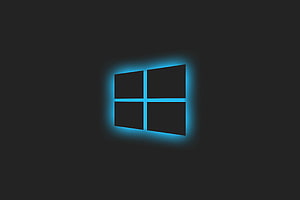 Glowing Windows 10 Logo on Dark Background HD wallpaper