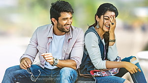 Vijay Deverakonda and Pooja Hegde laughing together in a candid outdoor scene from Geetha Govindam HD wallpaper