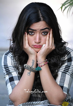 Rashmika Mandanna Portrait in Checkered Shirt with Hands on Face HD phone wallpaper