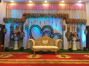 Elegant Wedding Stage Decor With Golden Sofa And Floral Heart Backdrop HD wallpaper
