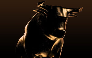Golden Bull Statue Sculpture With Dramatic Lighting And Dark Background HD wallpaper