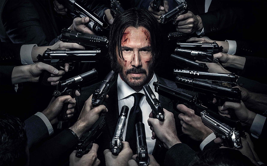 John Wick Surrounded by Guns in Suit HD wallpaper