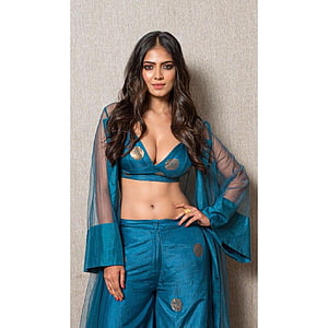 Deepika Chikhalia in a stylish teal blue traditional outfit with gold accents and sheer sleeves HD phone wallpaper