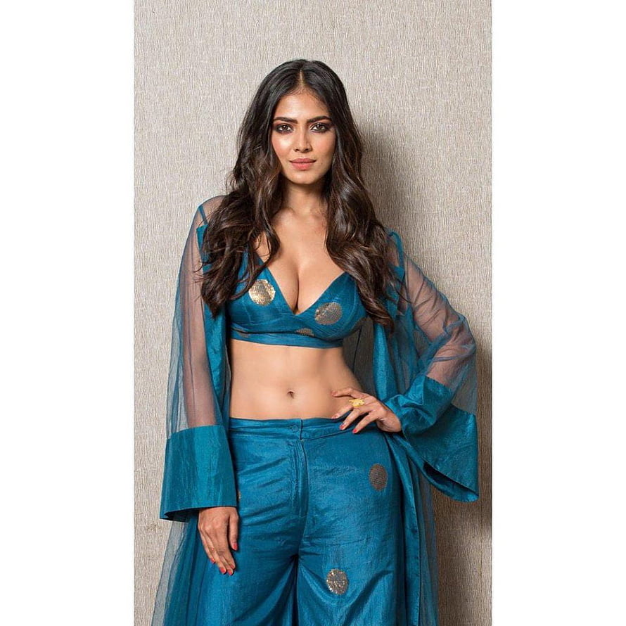 Deepika Chikhalia in a stylish teal blue traditional outfit with gold accents and sheer sleeves HD phone wallpaper