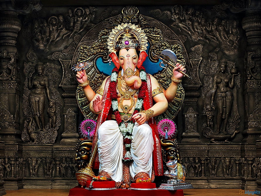 Lord Ganesha Statue with Axe and Lotus in Ornate Temple Setting HD wallpaper