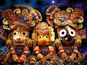 Traditional Indian Jatra Masks with Intricate Headdresses and Floral Garlands HD wallpaper