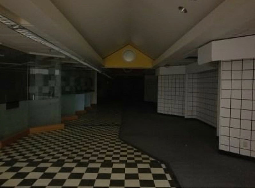 Dreamcore Aesthetic: Dim Interior with Checkerboard Floor and Tiled Walls HD wallpaper