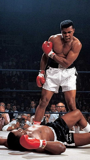 Muhammad Ali Standing Over Downed Opponent in Classic Boxing Ring HD phone wallpaper