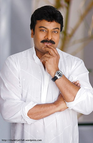 Chiranjeevi in a white kurta with a thoughtful pose and wristwatch HD phone wallpaper